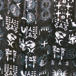 Close-up shot of the All Religions shirt design by Leon Dream