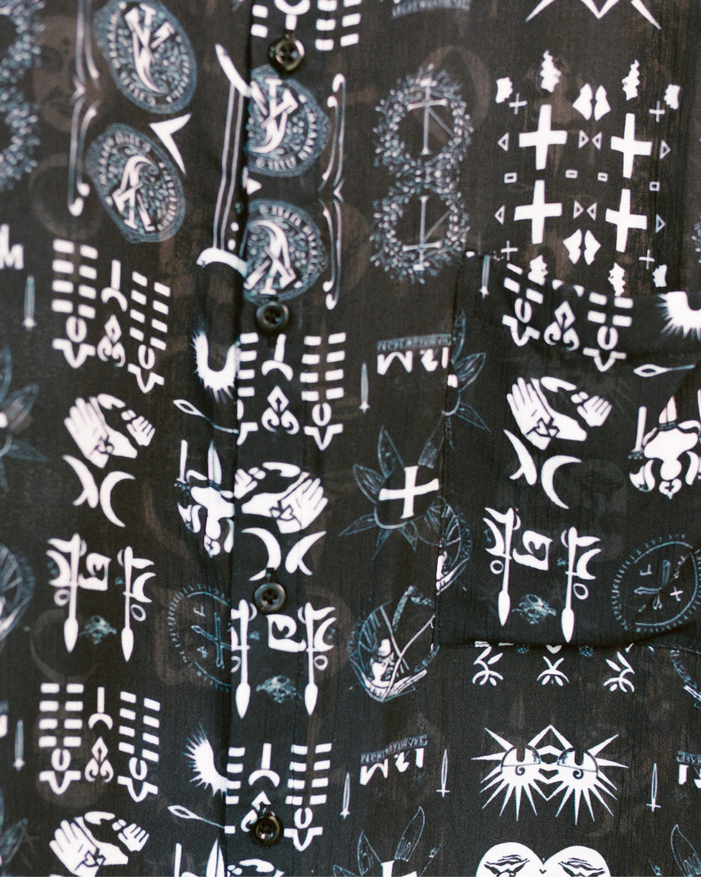 Close-up shot of the All Religions shirt design by Leon Dream