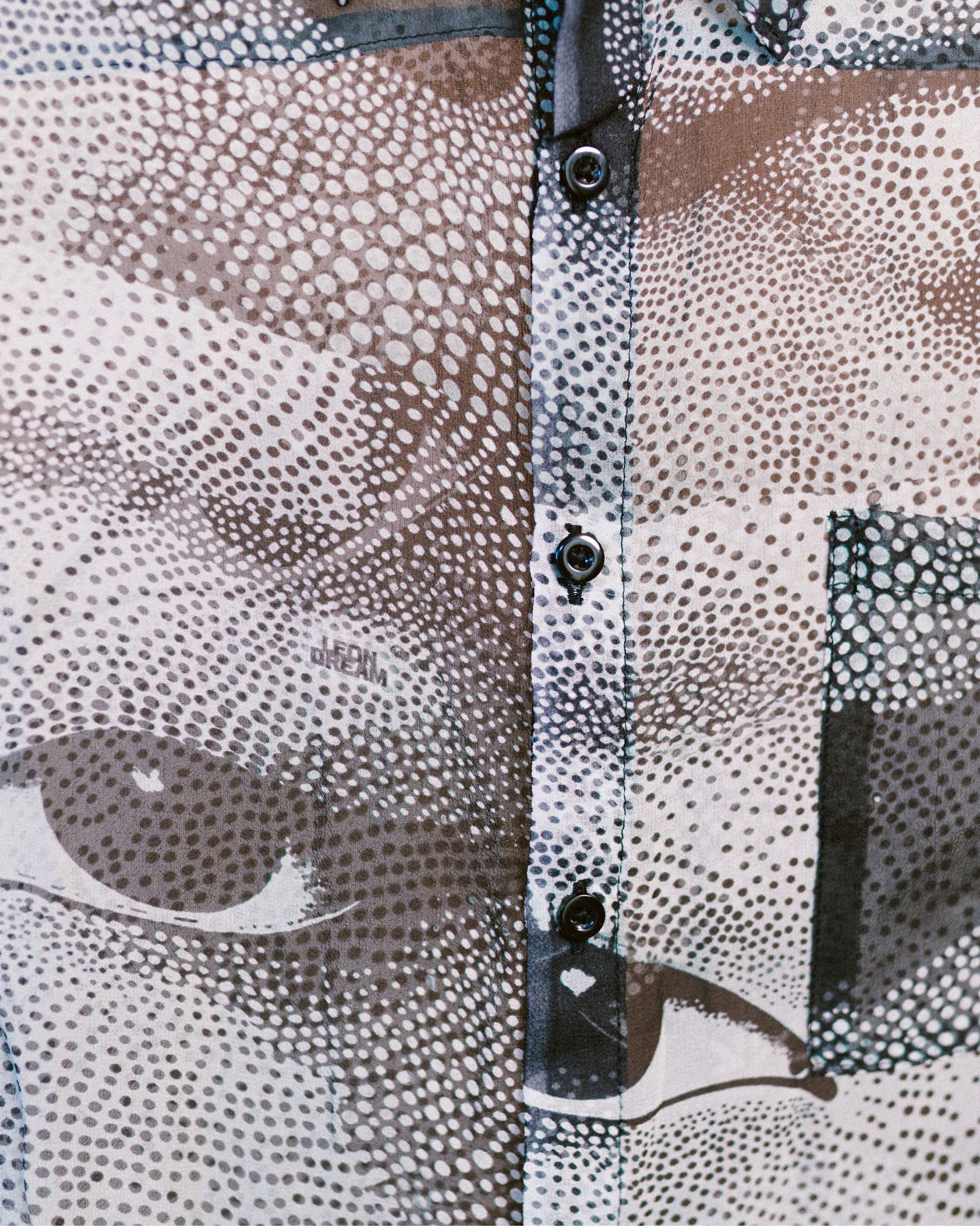 Close-up shot of the Kink shirt patterns by Leon Dream