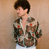 Man wearing the Lucky Cat shirt by Leon Dream