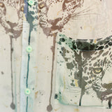 Close-up shot of the Matcha Leopard pattern on silk chiffon shirt by Leon Dream