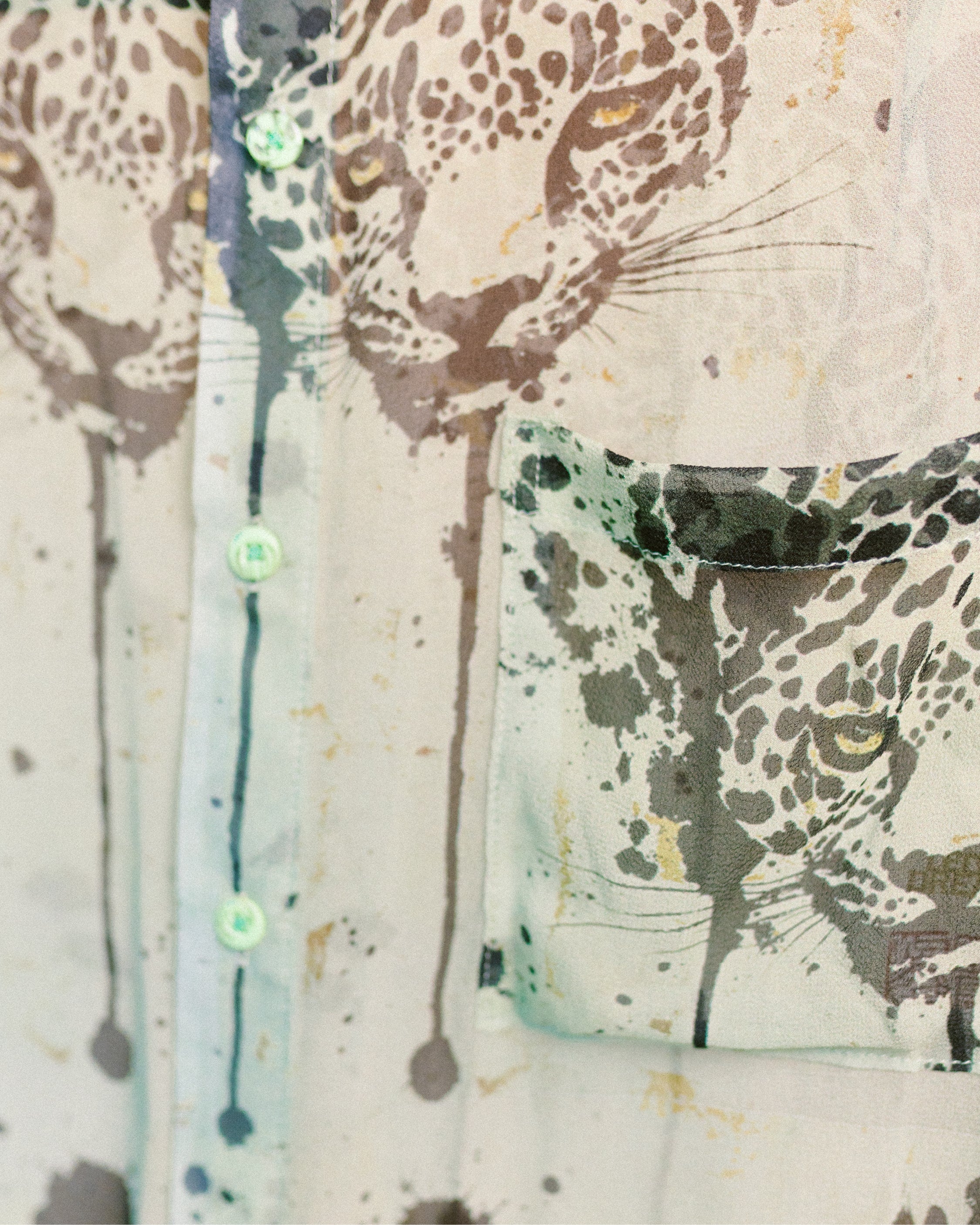Close-up shot of the Matcha Leopard pattern on silk chiffon shirt by Leon Dream