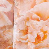 Close-up shot of the Plush Petals pattern on a shirt by Leon Dream