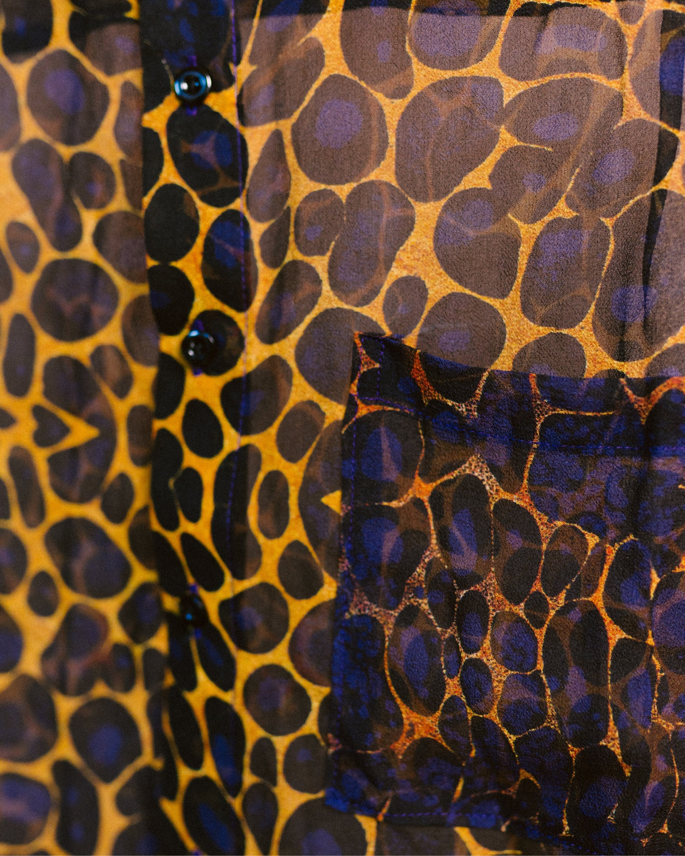Close-up shot of the Psychadelic Leopard silk shirt by Leon Dream