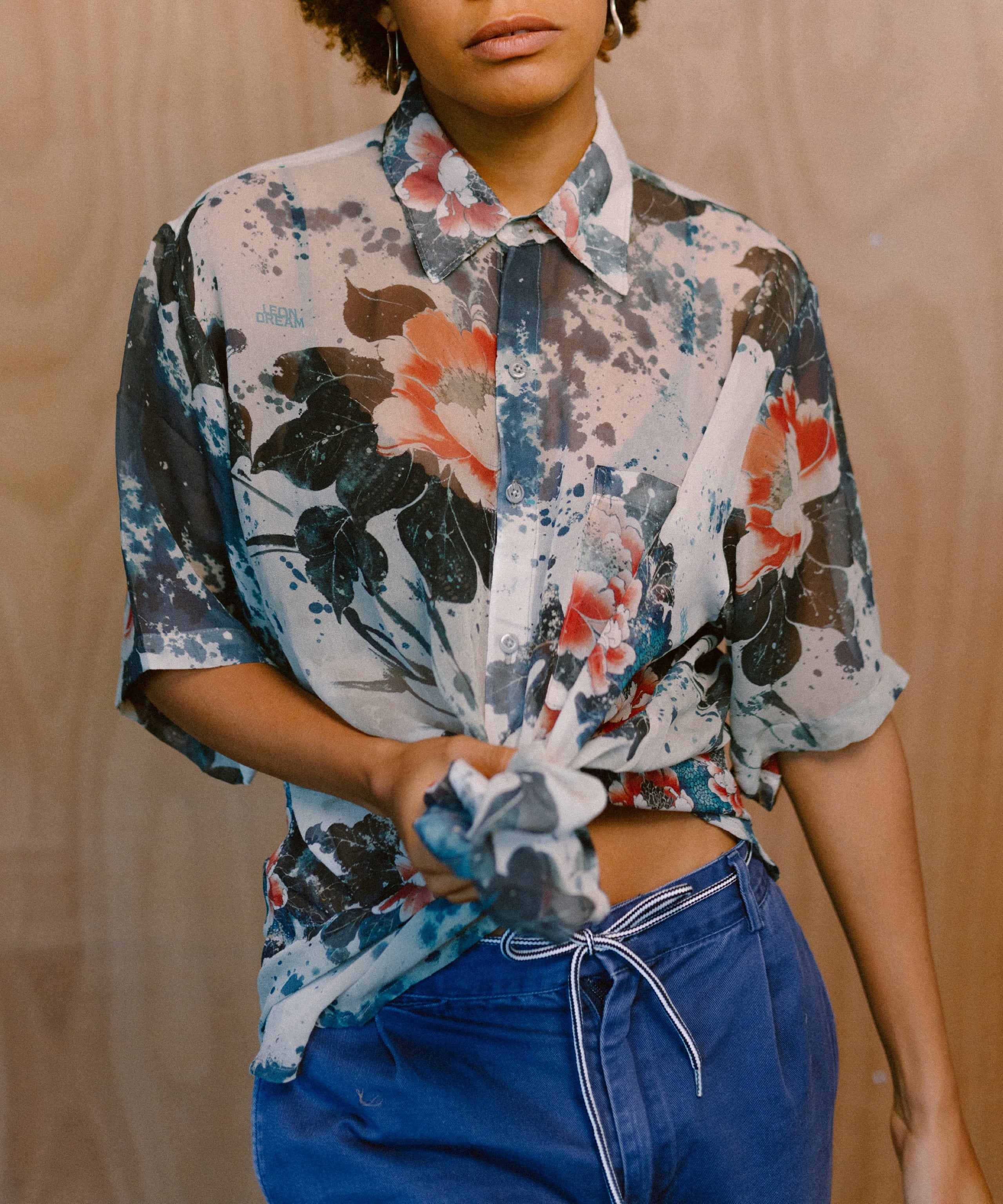 Woman wearing the Sensu Grace shirt by Leon Dream